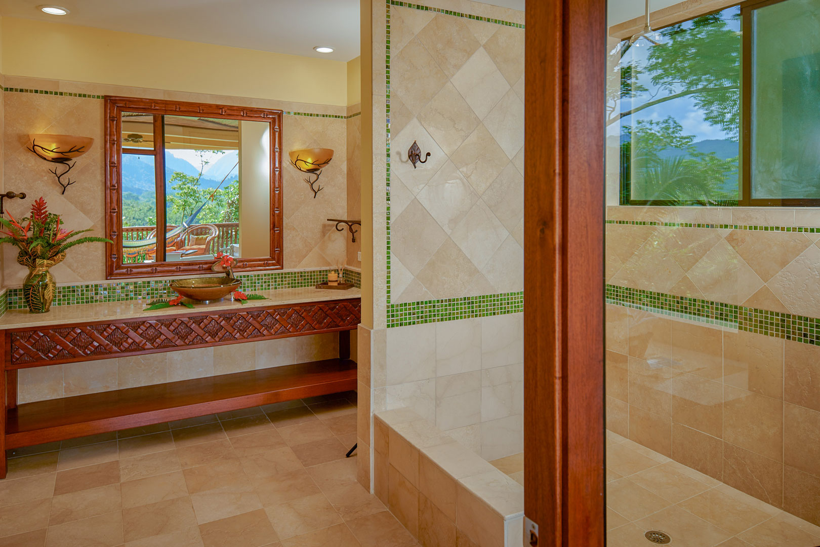The master bathroom with a walk in shower inside the Mountain View Suites at The Rainforest Lodge at Sleeping Giant