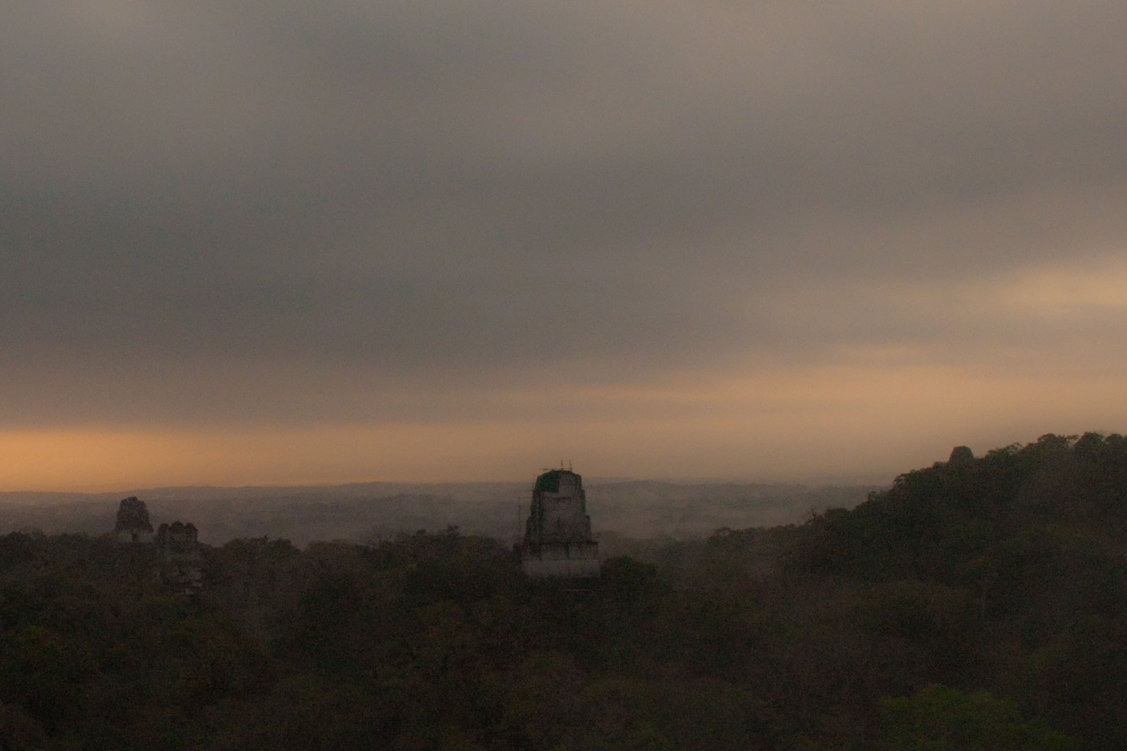 A far aerial view of the Tikal Maya Temple in Guatemala at the Tikal Mayan Adventure for The Rainforest Lodge at Sleeping Giant.