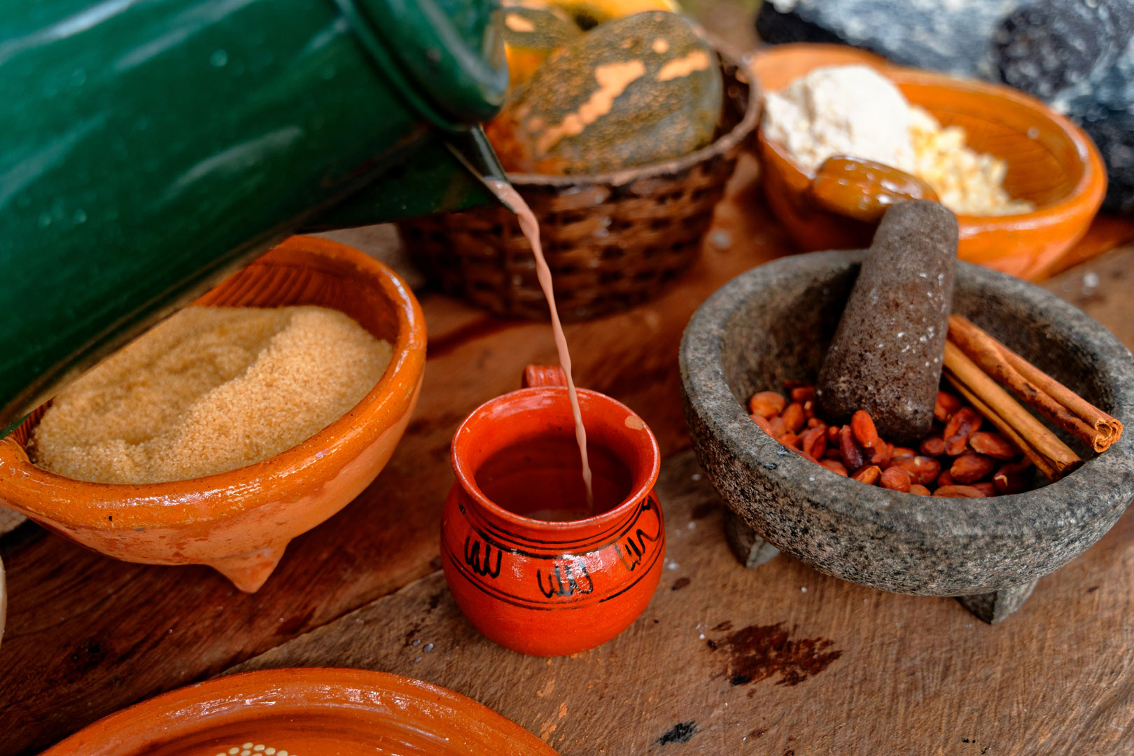 Traditional Maya Cacao drink in a handcrafted clay cup at The Rainforest Lodge at Sleeping Giant Resort