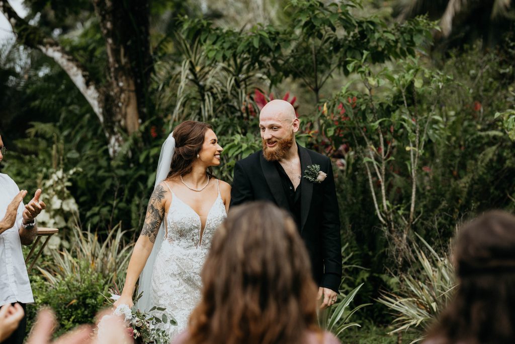 A married couple looking at each other with love at The Rainforest Lodge at Sleeping Giant