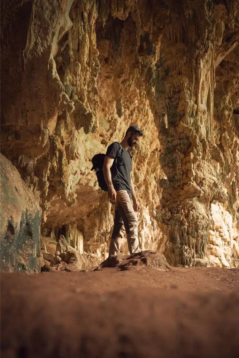 A cave exploring the ceremonial cave at the Rainforest Lodge at Sleeping Giant