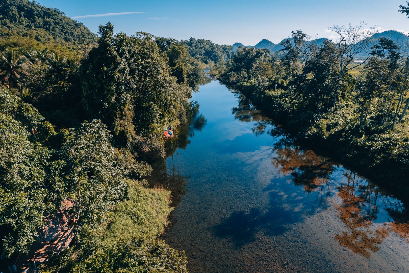 An aerial shot of the river at The Rainforest Lodge at Sleeping Giant